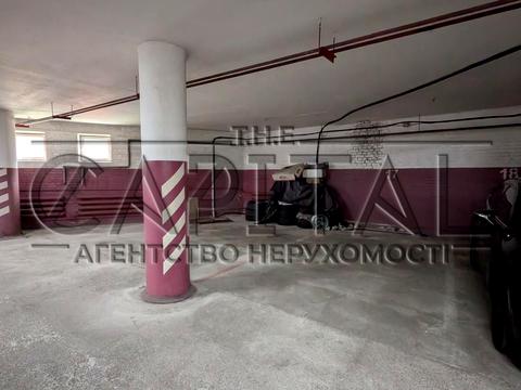 паркомісце за адресою Євгена Коновальця вул. (Щорса), 36-Б