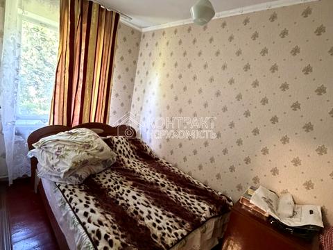 будинок за адресою с-ще. Трійчате (Комсомольське), Залізнична, 21