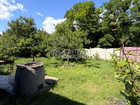 будинок за адресою с-ще. Трійчате (Комсомольське), Залізнична, 21
