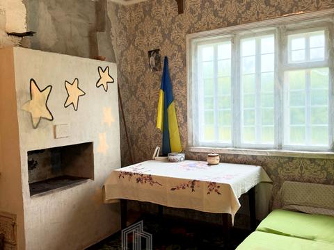 будинок за адресою с. Тростинка, Артема, 39