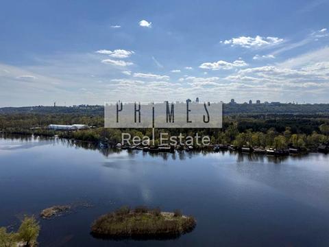 комерційна за адресою Микільсько-Слобідська вул., 11