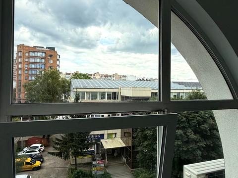 комерційна за адресою Подільська вул., 58
