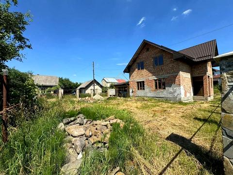 будинок за адресою Коновальця