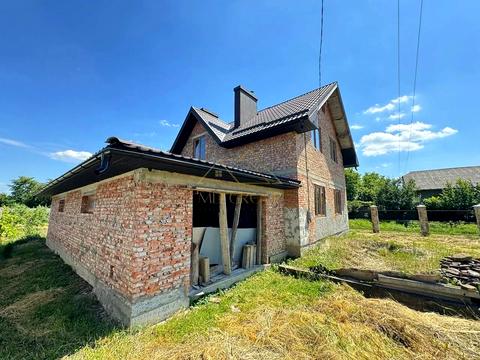 будинок за адресою Коновальця