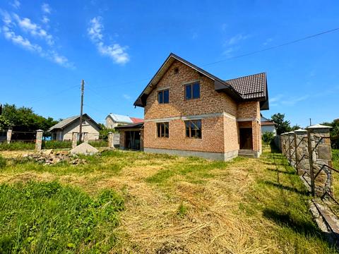 будинок за адресою Коновальця