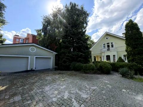 будинок за адресою Токмацька вул. (Великолуцька), 46