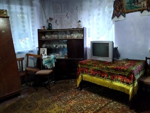 дом по адресу с. Поправка, Центральна