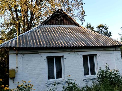 дом по адресу с. Поправка, Центральна
