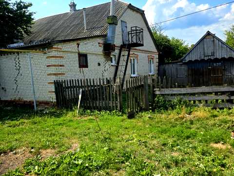 дом по адресу Середня