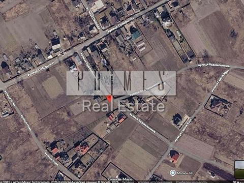 участок по адресу Будівельників