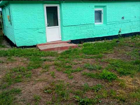 будинок за адресою с. Кунча, Набережна, 32