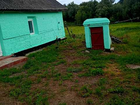 будинок за адресою с. Кунча, Набережна, 32