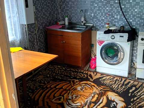будинок за адресою с. Кунча, Набережна, 32