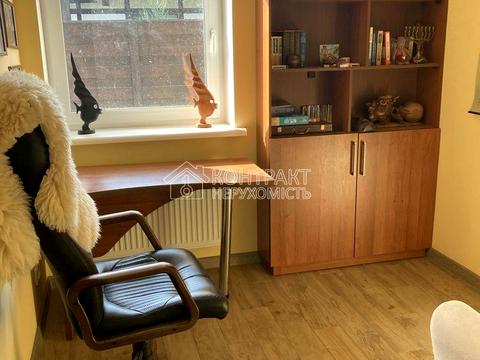 будинок за адресою Генерала Удовиченка вул. (Паризької Комуни), 125