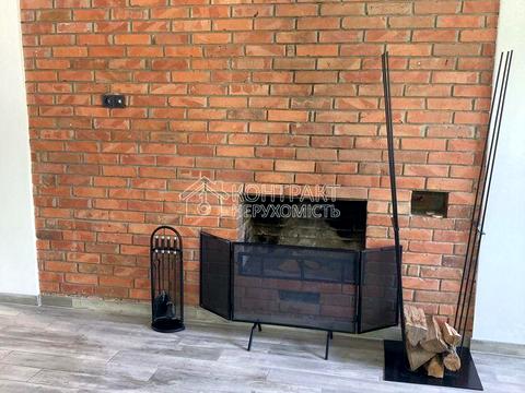 будинок за адресою Генерала Удовиченка вул. (Паризької Комуни), 125