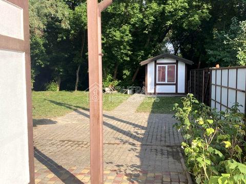 будинок за адресою Генерала Удовиченка вул. (Паризької Комуни), 125