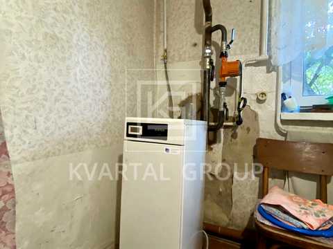 будинок за адресою с. Дмитрівка, Київська вул. (Мічуріна), 79