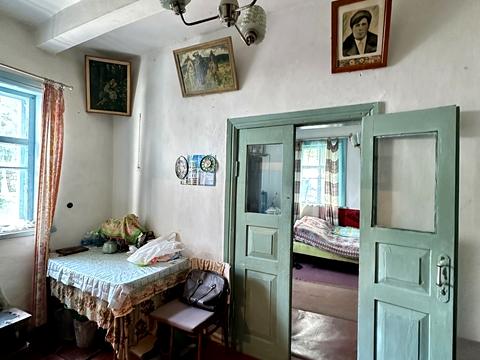 будинок за адресою с. Поправка, Садова