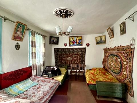 будинок за адресою с. Поправка, Садова