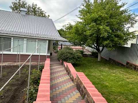 будинок за адресою 1-й Кам'янецький проїзд, 58