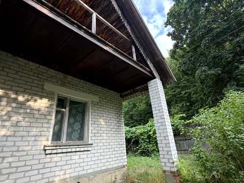 будинок за адресою с. Малі Кошарища, Зарічна, 1б