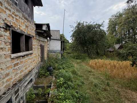 будинок за адресою с. Малі Кошарища, Зарічна, 1б