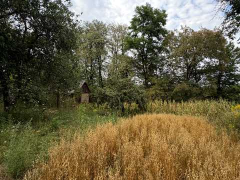 будинок за адресою с. Малі Кошарища, Зарічна, 1б