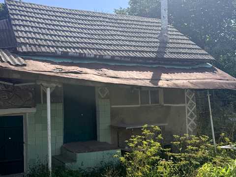будинок за адресою с. Вівся, Центральна