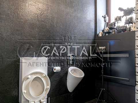 будинок за адресою смт. Козин, Лугова вул., 34