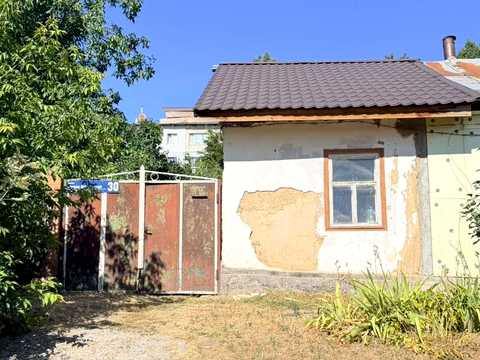 будинок за адресою Євгена Коновальця вул. (Інтернаціональна)
