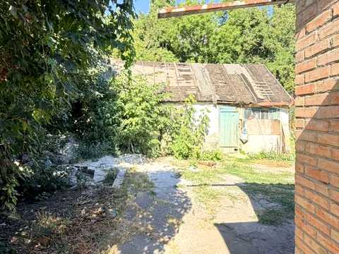 дом по адресу Евгения Коновальца ул. (Інтернаціональна)