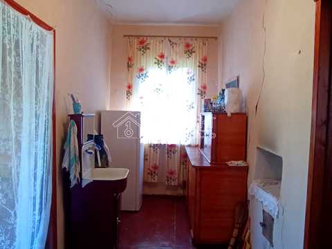 будинок за адресою смт. Коротич, ярковий провулок, 66