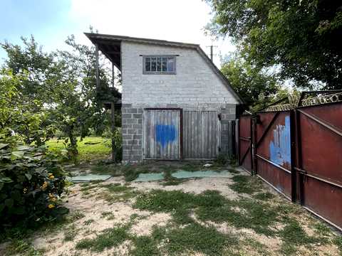 будинок за адресою с. Вороньків, провулок Миру, 8а