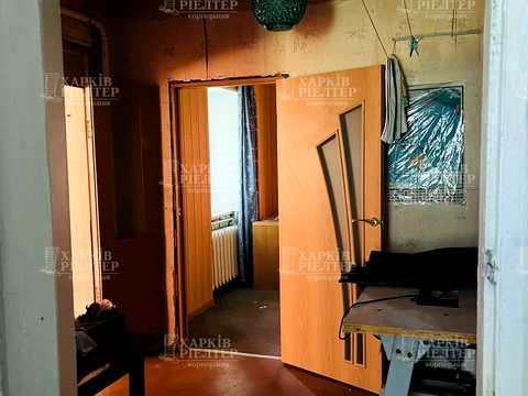 будинок за адресою смт. Буди, 1-го Травня вул., 8