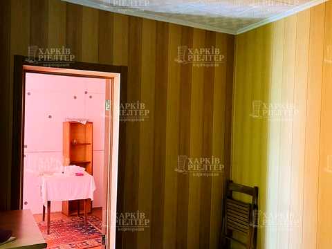 будинок за адресою смт. Буди, 1-го Травня вул., 8