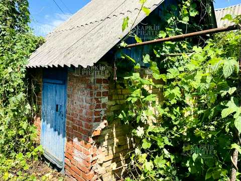 будинок за адресою смт. Буди, 1-го Травня вул., 8