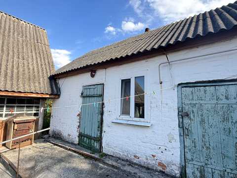 будинок за адресою с. Привороття, Житомирська, 27