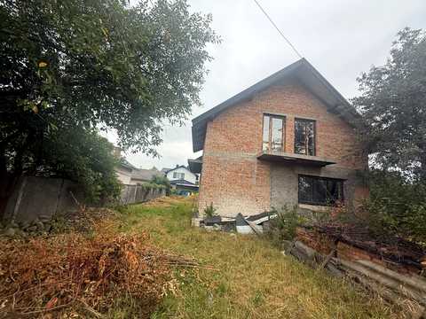 будинок за адресою Євгена Коновальця вул., 302
