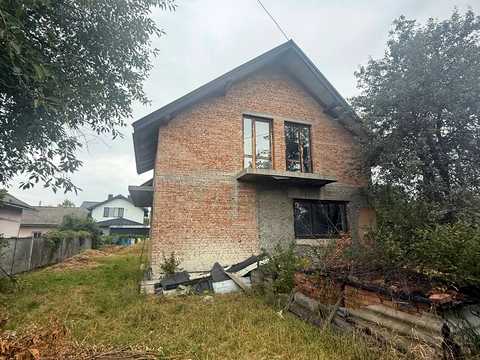 будинок за адресою Євгена Коновальця вул., 302