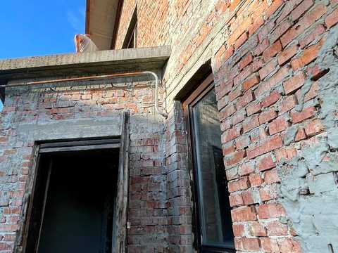 будинок за адресою Євгена Коновальця вул., 302