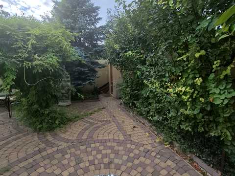 будинок за адресою Тіниста вул., 18