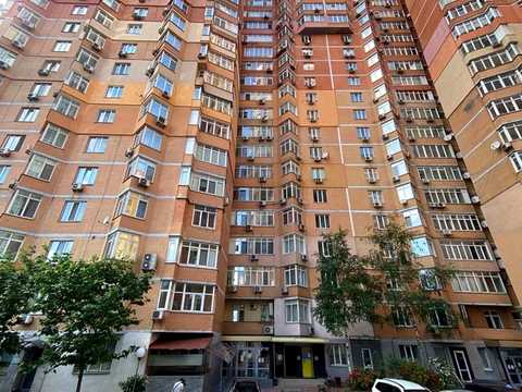 комерційна за адресою Євгена Коновальця вул. (Щорса), 32-Г