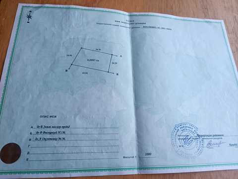 ділянка за адресою с. Пухівка, Посічанська