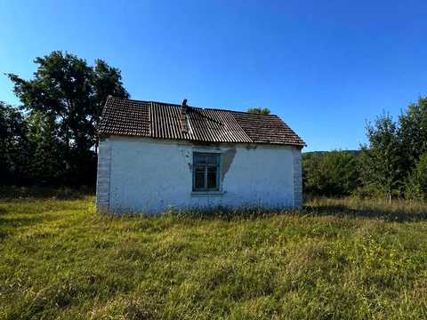 будинок за адресою Корчі вул. (Комсомольська), 32