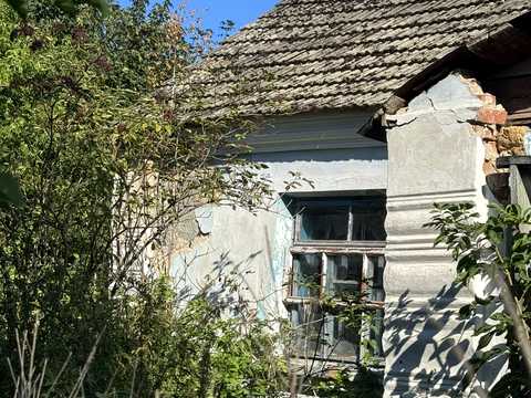 будинок за адресою Корчі вул. (Комсомольська), 32