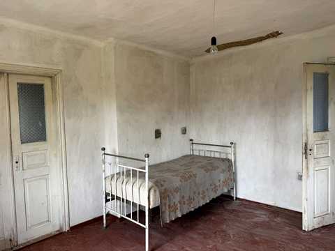 будинок за адресою с. Сураж, Грибелька, 1