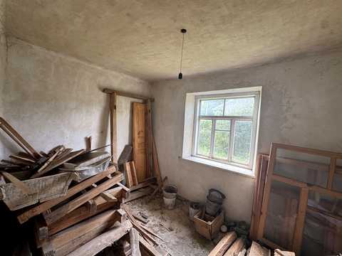 будинок за адресою с. Сураж, Грибелька, 1