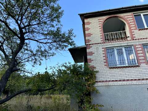 будинок за адресою с. Романівка, Малинова, 16