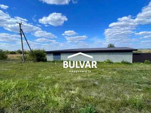 комерційна за адресою Шкільна вул. (Леніна), 1