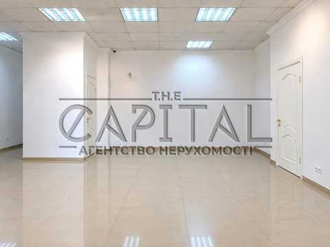 комерційна за адресою Євгена Коновальця вул. (Щорса), 32-Б